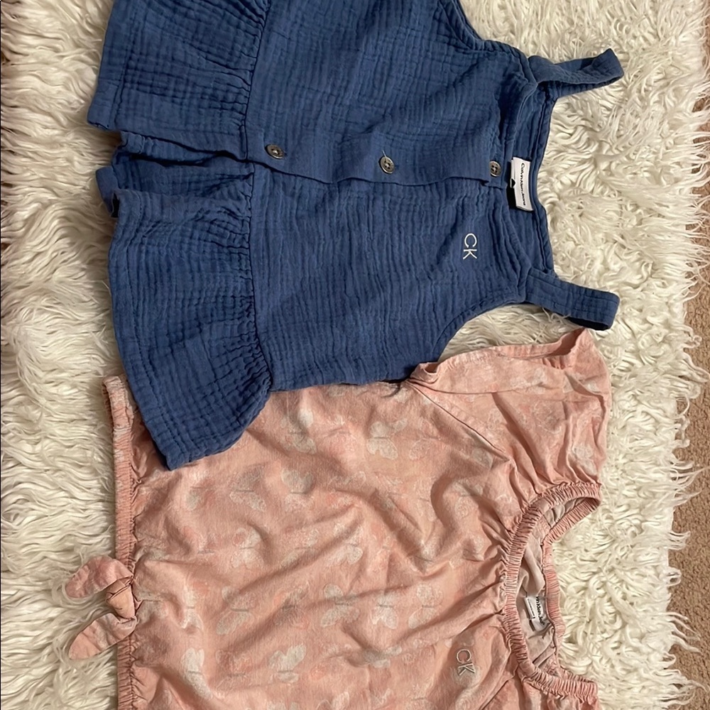 Two set of Calvin Klein jeans girls Blue and Pink top (size 7)